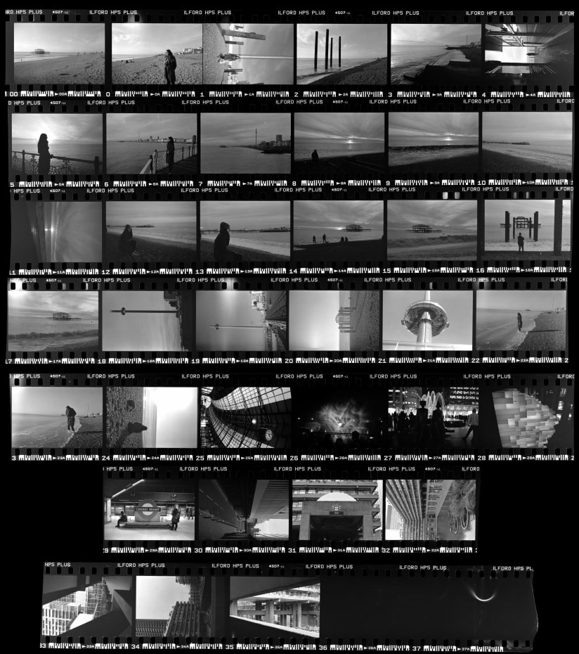 Contact sheet of a black and white film of a trip to Brighton, Canary Wharf and Barbican